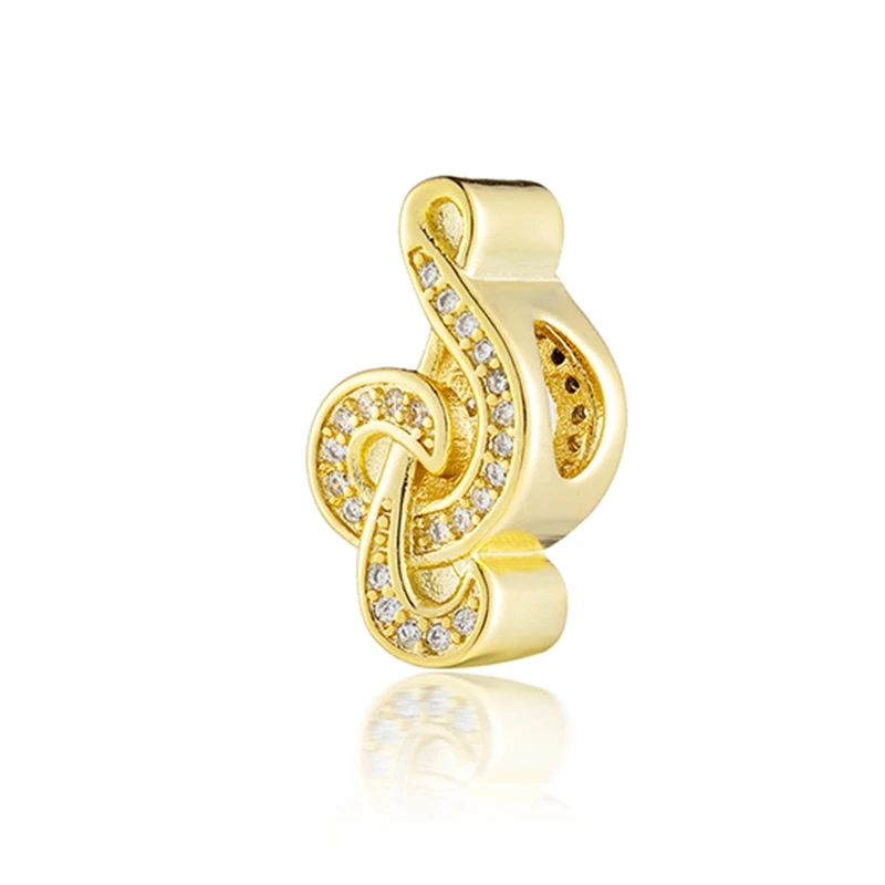 Charm Llave de Sol Dorada